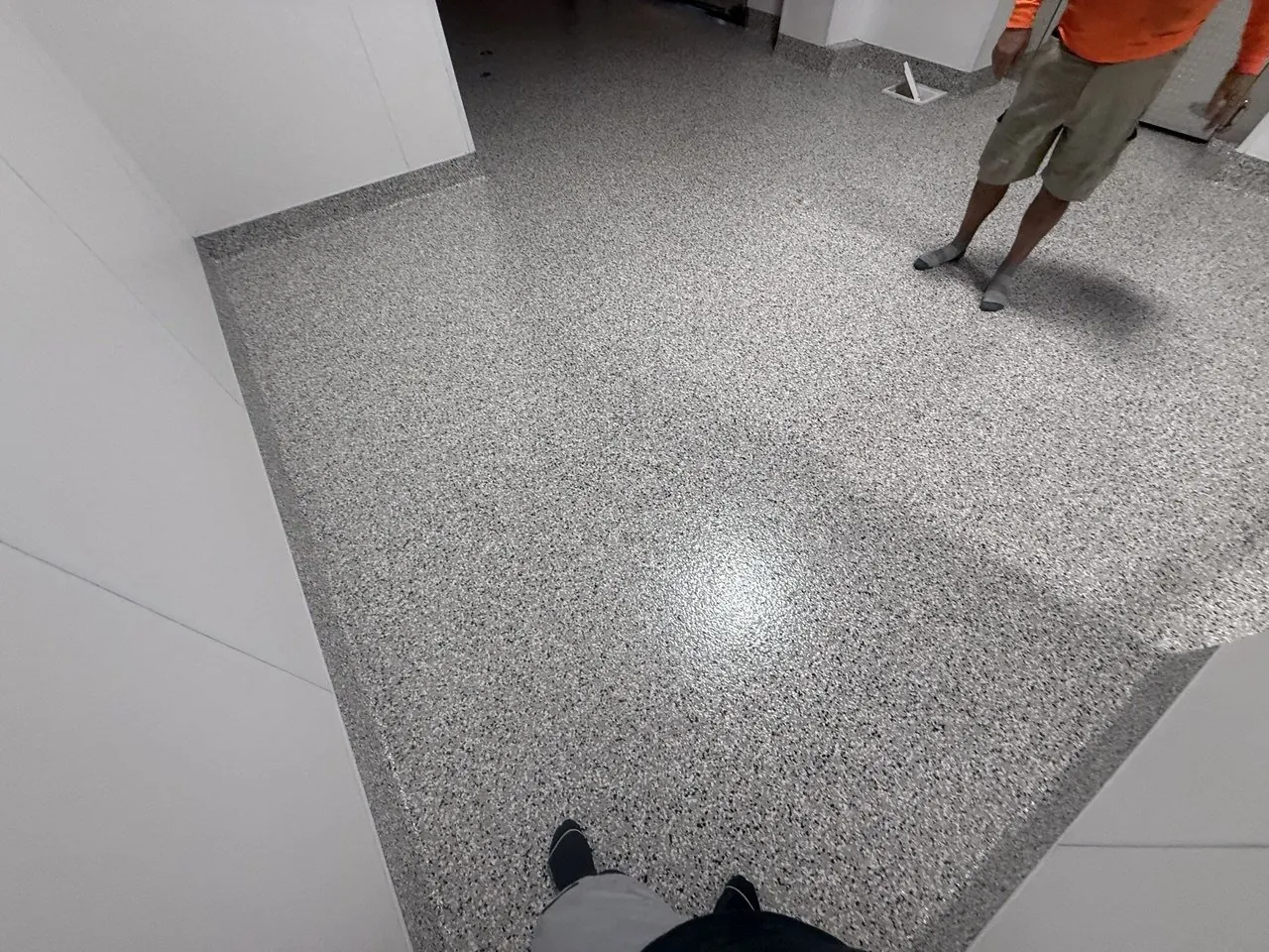 Commercial kitchen flake epoxy floor Naples FL — Detail shot — flake broadcast texture