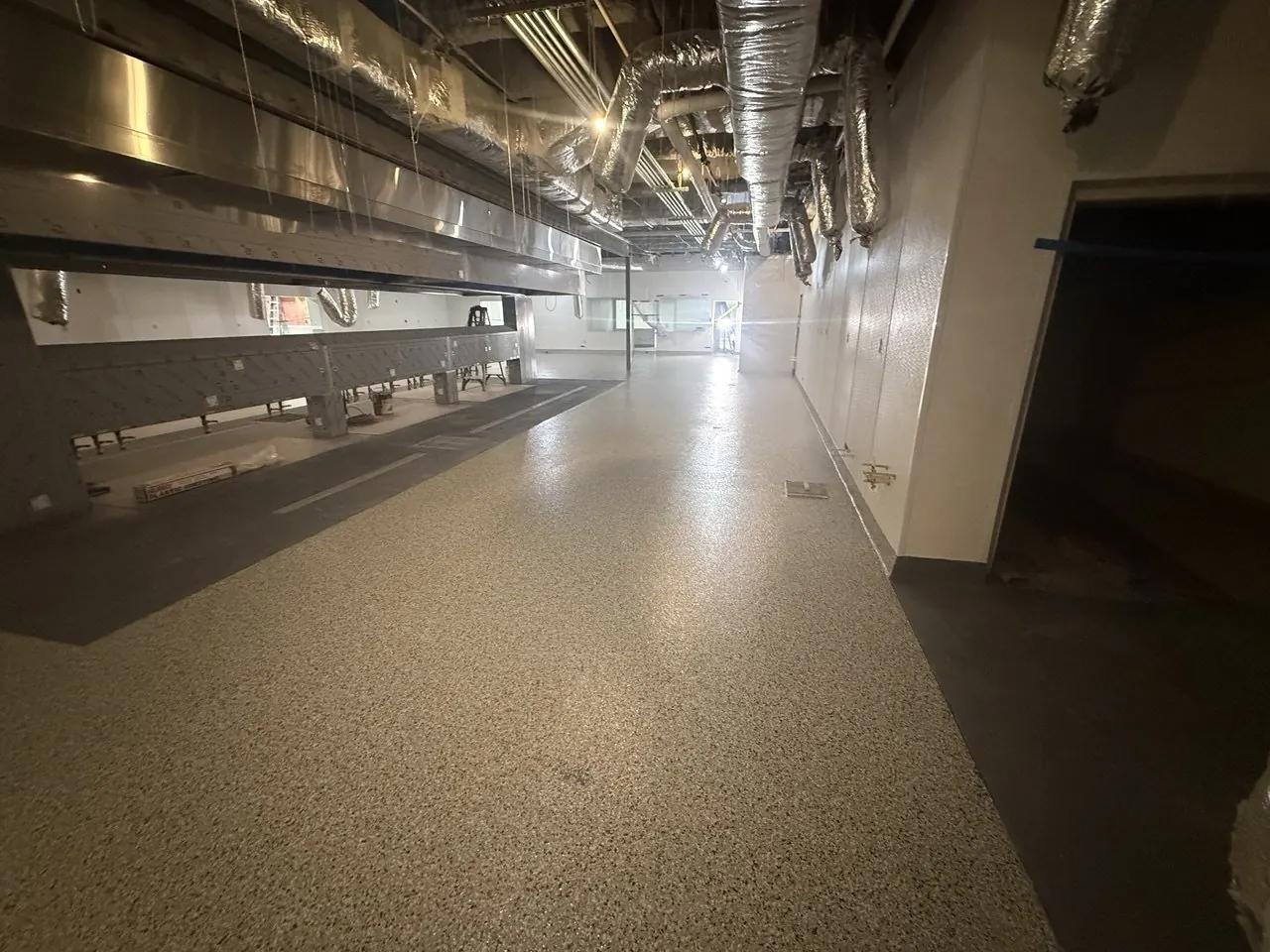 Commercial kitchen flake epoxy floor Naples FL — Service corridor — seamless runs