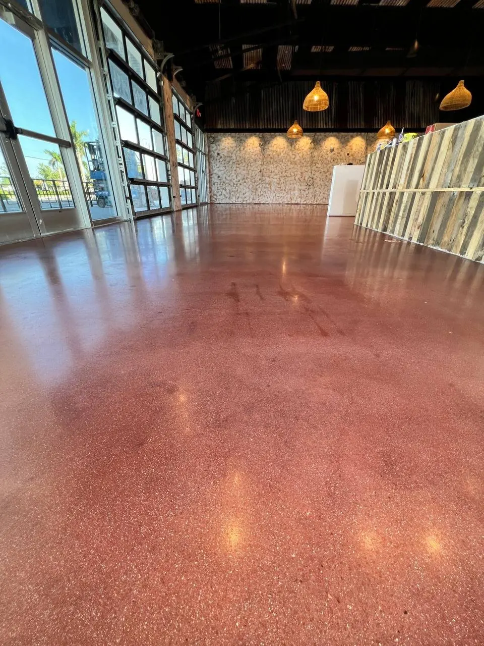 Polished concrete burgundy stain Naples FL restaurant — Finish · Gloss